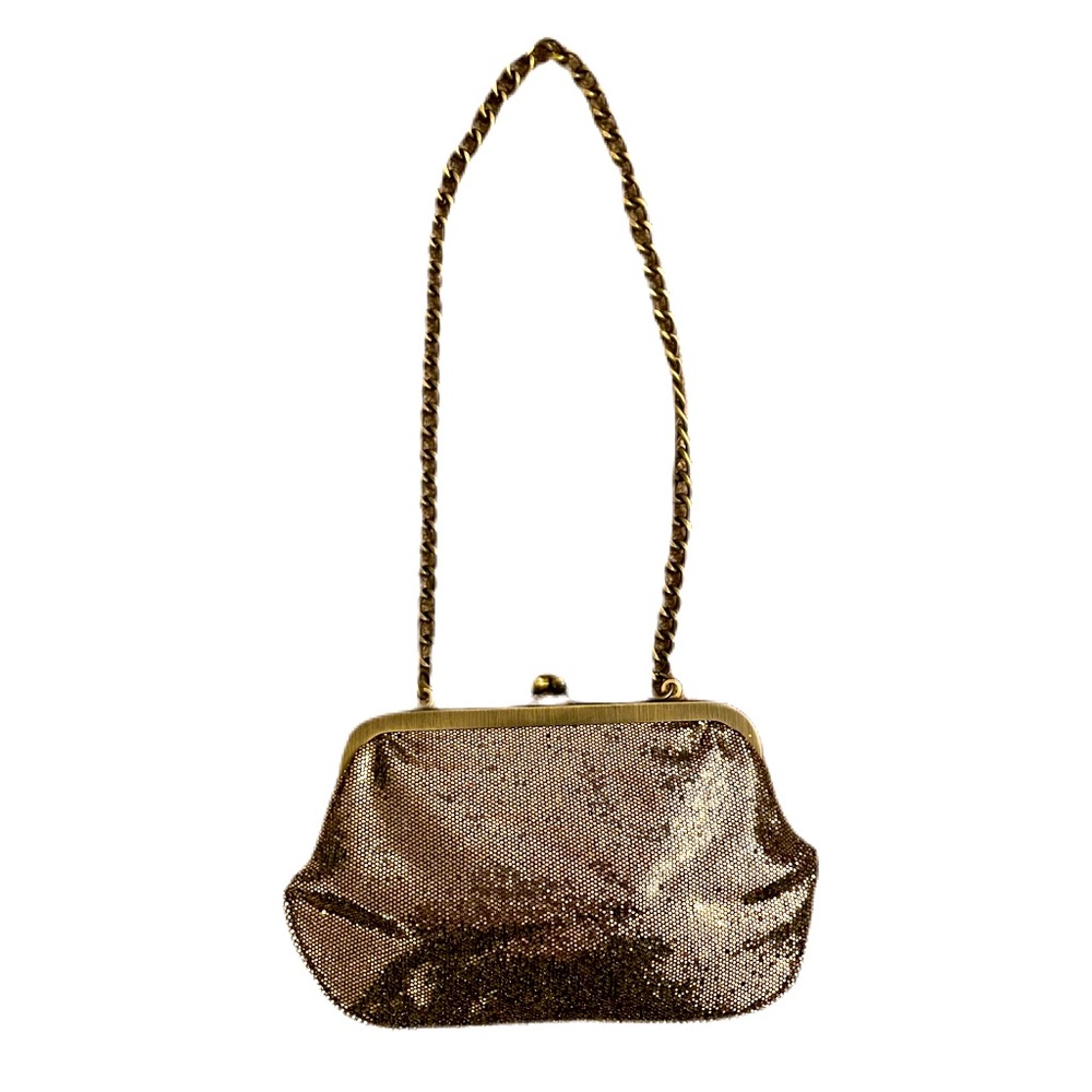Small gold Express purse with shoulder chain.